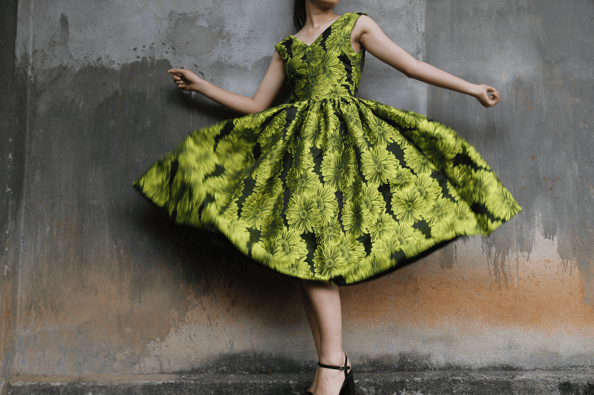 Photo by Anne: https://www.pexels.com/photo/photo-of-a-woman-wearing-green-dress-985635/